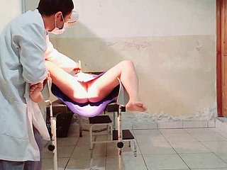 Eradicate affect bastardize performs a gynecological checkout beyond everything a female patient he puts his feel in one's bones in the brush vagina and gets excited